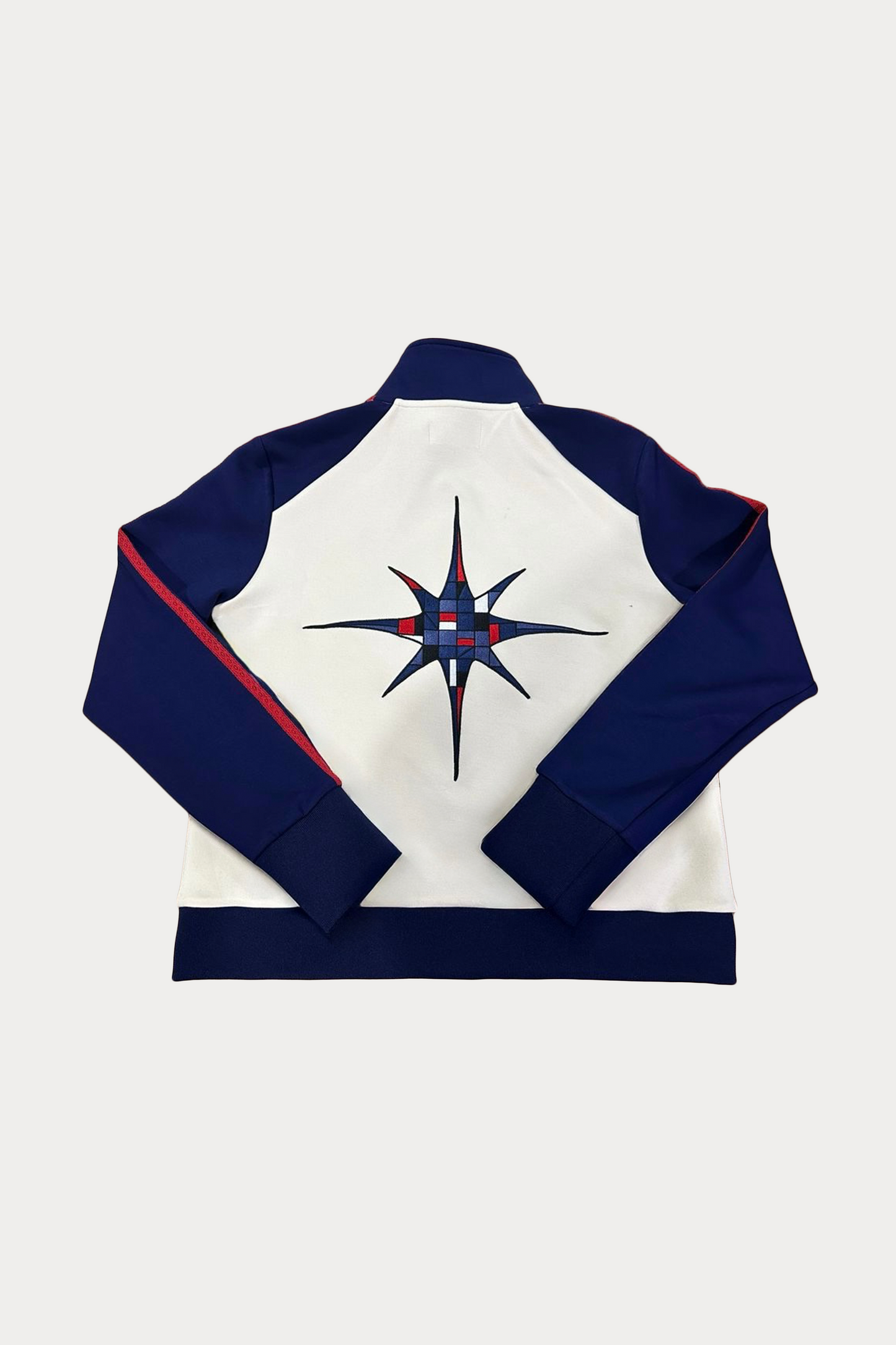 Vidrieras Track Jacket Back – premium track jacket and tracksuit jacket style design featuring navy sleeves, cream body, and embroidered DUENDE detailing, perfect as a modern jacket track silhouette