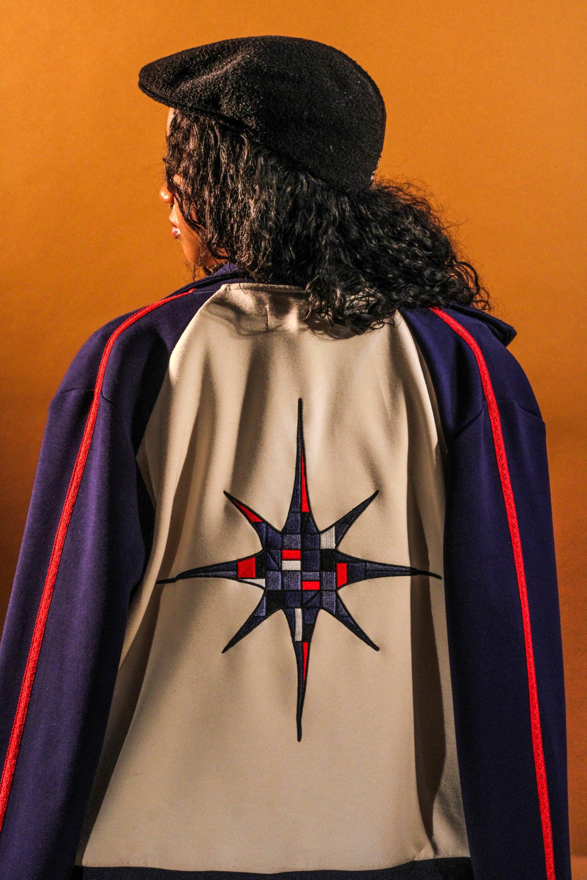 Model wearing the Vidrieras Track Jacket, a premium track jacket and tracksuit jacket style with a clean jacket track silhouette